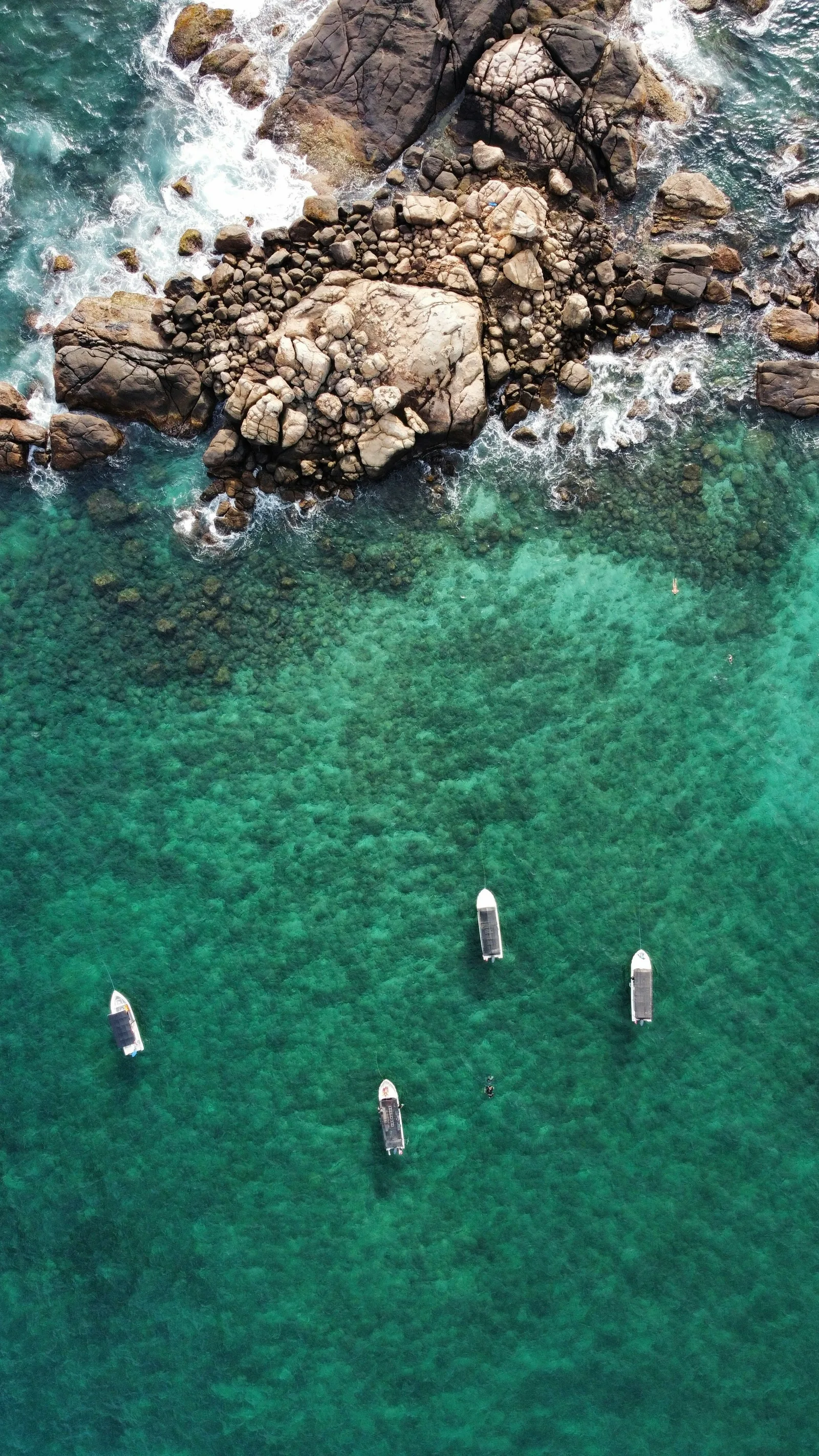 Sunset glow over tranquil turquoise waves along southern coast